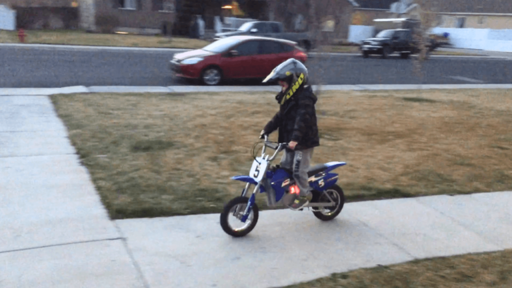 Milo riding the Razor MX350